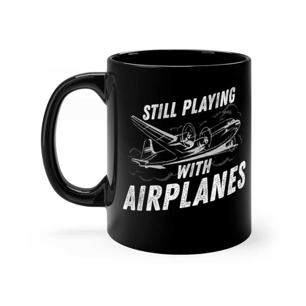 STILL PLAYING WITH AIRPLANES DESIGNED - MUG Printify