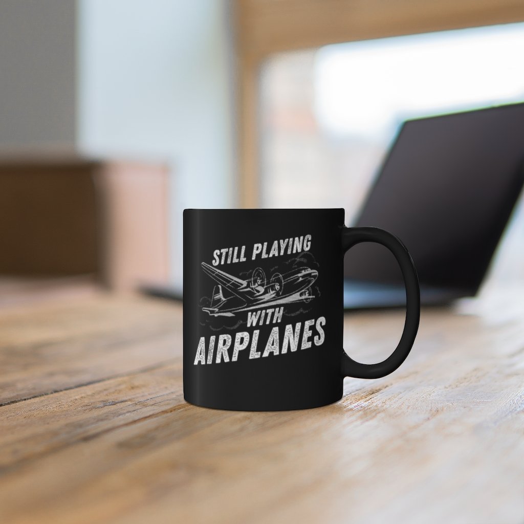 STILL PLAYING WITH AIRPLANES DESIGNED - MUG Printify